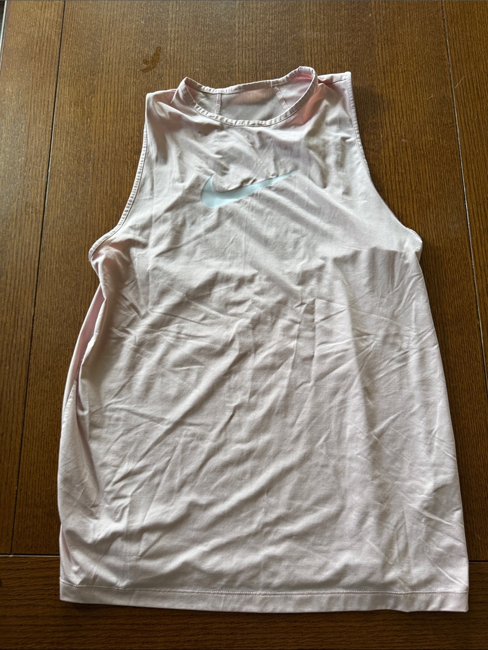 Nike Pale Pink Women's Sleeveless Training Tank with White Swoosh